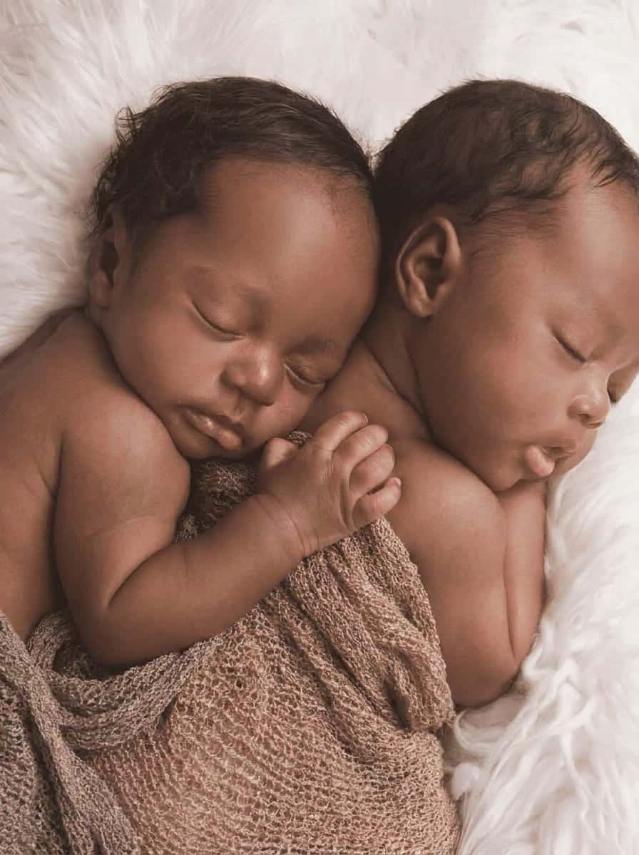 Newborn twin babies sleeping