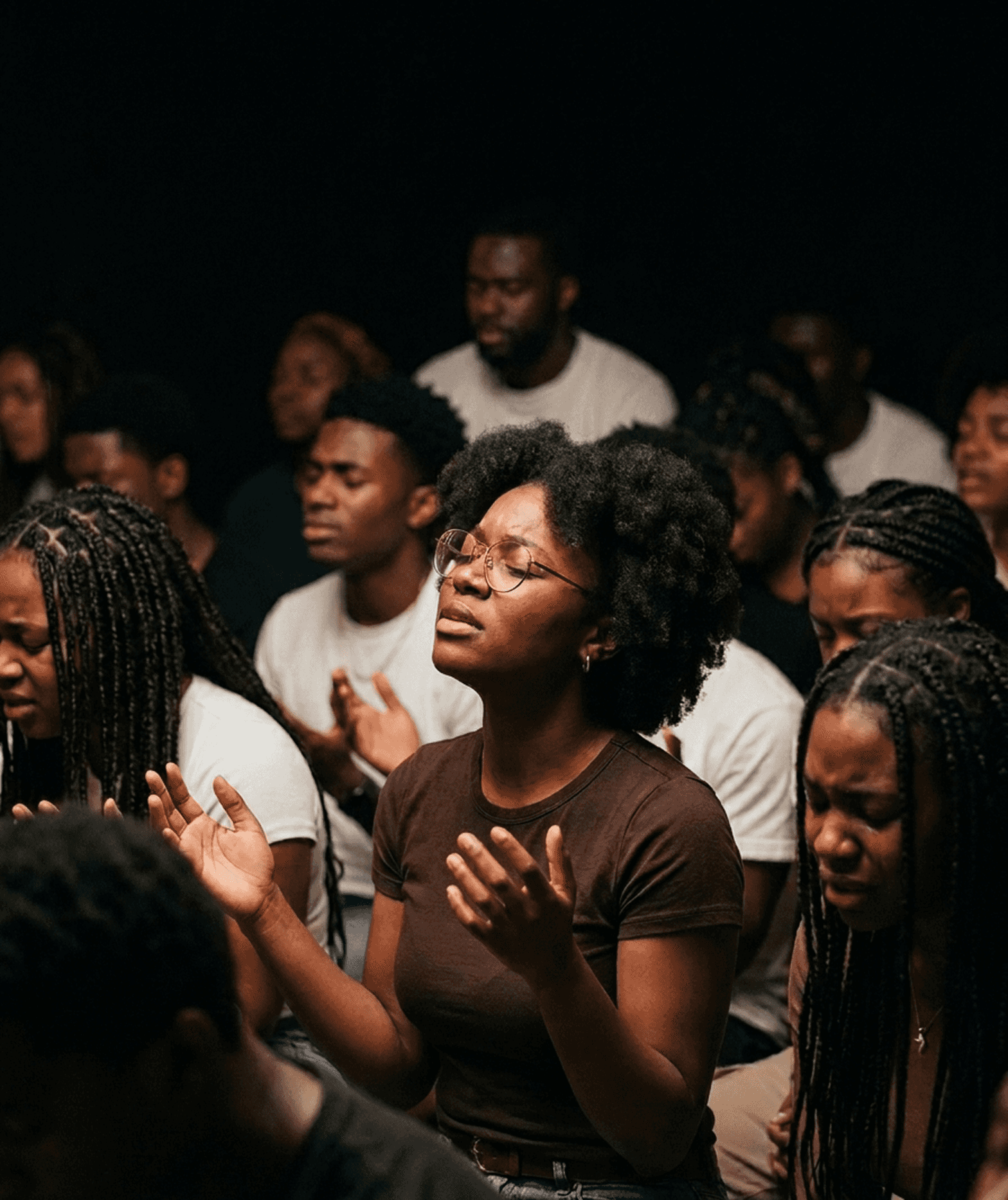 Young adult worshipping